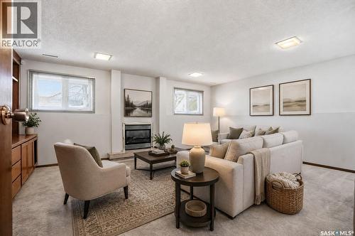 227 Flavelle Crescent, Saskatoon, SK - Indoor Photo Showing Living Room With Fireplace