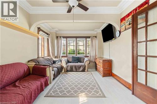 Living area featuring light wood-finish flooring and a ceiling fan - 151 Louisa Street, Kitchener, ON - Indoor