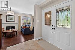 Double entry doors with decorative glass panels - 
