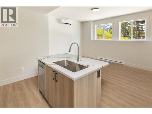 2125 Montenegro Drive, Kelowna, BC - Indoor Photo Showing Kitchen With Double Sink