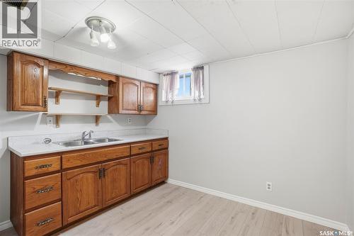 721 H Avenue S, Saskatoon, SK - Indoor Photo Showing Kitchen With Double Sink