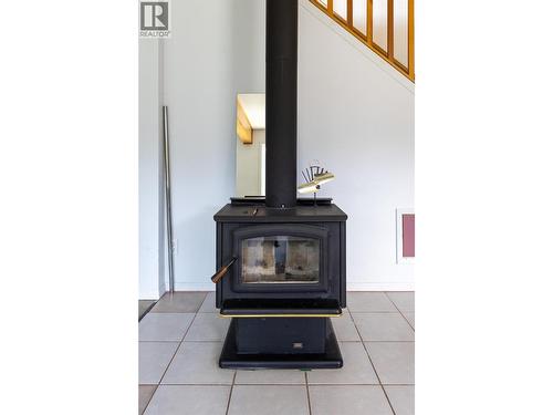 6728 3A Highway, Nelson, BC - Indoor Photo Showing Living Room With Fireplace