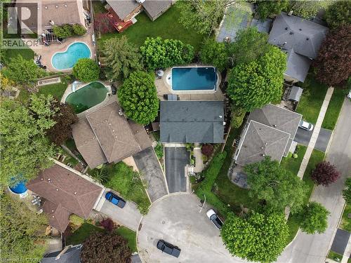 Aerial view of a residential property with a dark grey shingled roof - 2207 Jester Court, Burlington, ON - Outdoor With In Ground Pool With View