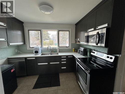 2616 Clarence Avenue S, Saskatoon, SK - Indoor Photo Showing Kitchen With Double Sink