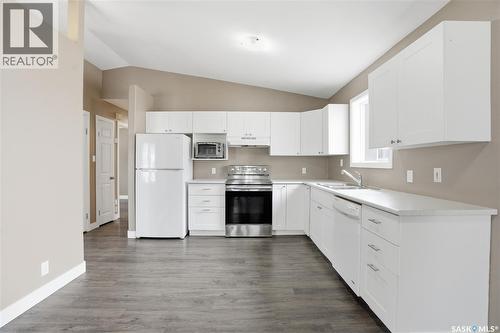 330B X Avenue S, Saskatoon, SK - Indoor Photo Showing Kitchen With Double Sink
