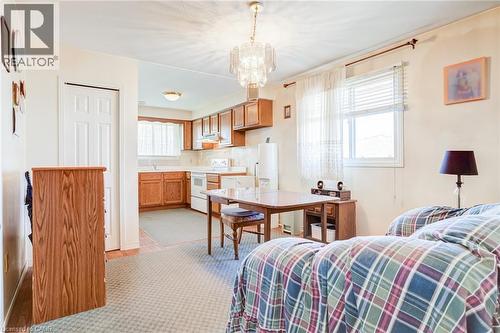 Open-concept living space featuring a clear sightline to the kitchen - 186 Adeline Avenue, Hamilton, ON - Indoor Photo Showing Bedroom