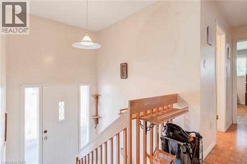 Entryway featuring a white door with decorative glass inserts, flanked by matching sidelights - 186 Adeline Avenue, Hamilton, ON - Indoor Photo Showing Other Room