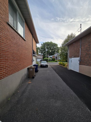Stationnement - 139 Av. Giroux, Laval (Laval-Des-Rapides), QC - Outdoor With Exterior