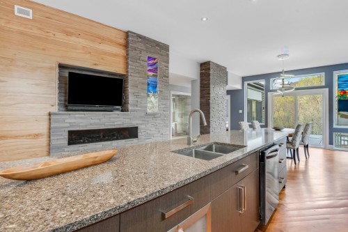 Kitchen - 25 Ch. Thibault, Val-Des-Monts, QC - Indoor Photo Showing Kitchen With Fireplace With Double Sink