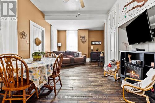 Dining Room and open concept living area - 171 Killaly Street W, Port Colborne (Main Street), ON - Indoor Photo Showing Dining Room With Fireplace