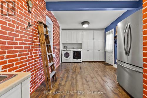 Main floor laundry with rear entrance from deck - 171 Killaly Street W, Port Colborne (Main Street), ON - Indoor Photo Showing Laundry Room