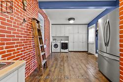 Main floor laundry with rear entrance from deck - 