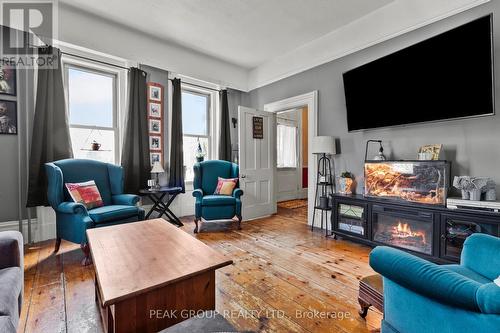 Family room which could be formal dining room - 171 Killaly Street W, Port Colborne (Main Street), ON - Indoor Photo Showing Living Room With Fireplace