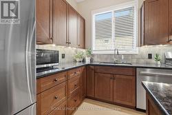 Main Floor: Kitchen - Stainless Steel Appliances - 