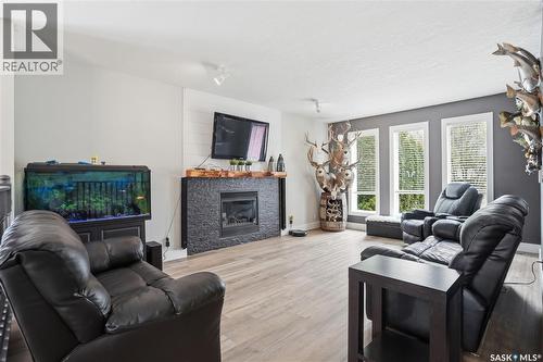 165 3Rd Street, Pilot Butte, SK - Indoor Photo Showing Living Room With Fireplace