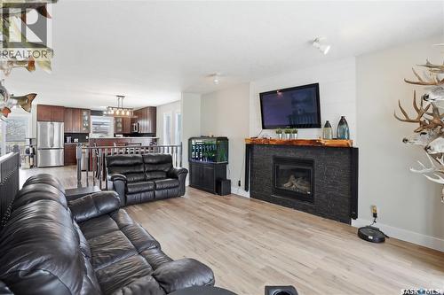 165 3Rd Street, Pilot Butte, SK - Indoor Photo Showing Living Room With Fireplace
