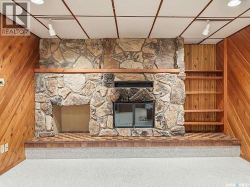 661 Dalgliesh Drive, Regina, SK - Indoor Photo Showing Other Room With Fireplace