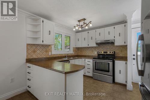 136 Martel Crescent, Champlain, ON - Indoor Photo Showing Kitchen With Double Sink