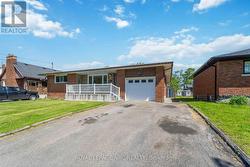 Plenty of parking in the double wide driveway - 