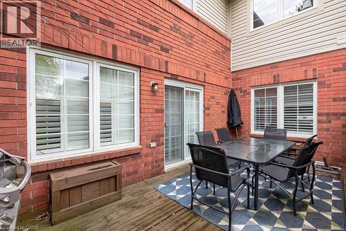 Living room walkout to deck & privacy fencing - 100 Beddoe Drive Unit# 101, Hamilton, ON - Outdoor With Deck Patio Veranda With Exterior