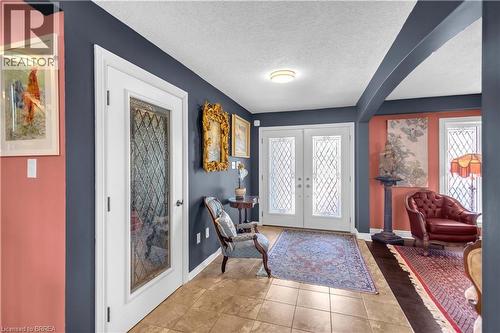 Double entry doors featuring decorative glass inserts - 69 Hunter Way, Brantford, ON - Indoor