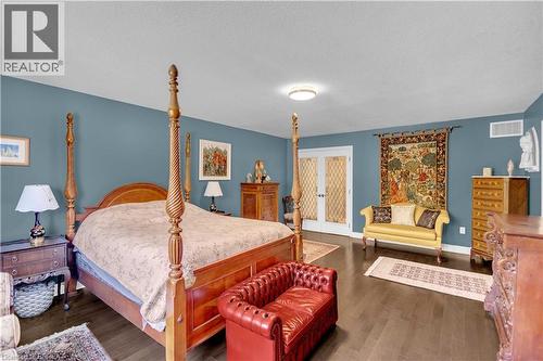 Spacious room featuring wood-finish flooring and a neutral ceiling - 69 Hunter Way, Brantford, ON - Indoor Photo Showing Bedroom
