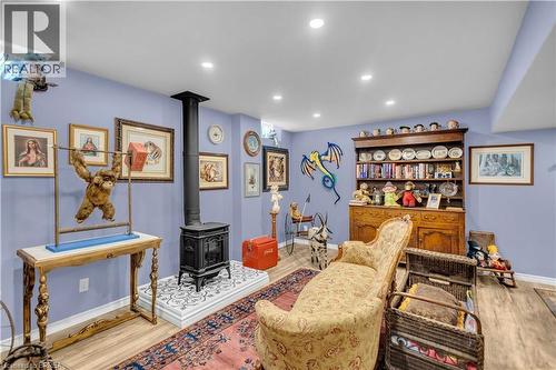 Recreational room featuring light blue walls and recessed lighting - 69 Hunter Way, Brantford, ON - Indoor