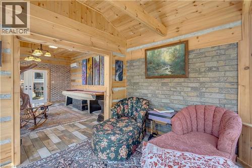 Vaulted wood-paneled ceiling with exposed beams - 69 Hunter Way, Brantford, ON - Indoor