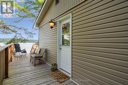 Welcoming entrance with a wrap around deck - 