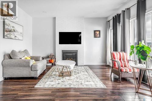3628 Gee Crescent, Regina, SK - Indoor Photo Showing Living Room With Fireplace