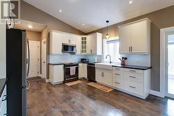 Kitchen with Vaulted Ceiling - 