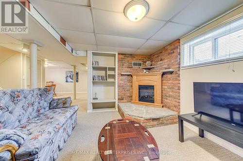 269 East 26Th Street, Hamilton, ON - Indoor Photo Showing Living Room With Fireplace