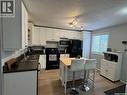 43 Marshall Crescent, Regina, SK  - Indoor Photo Showing Kitchen With Double Sink 