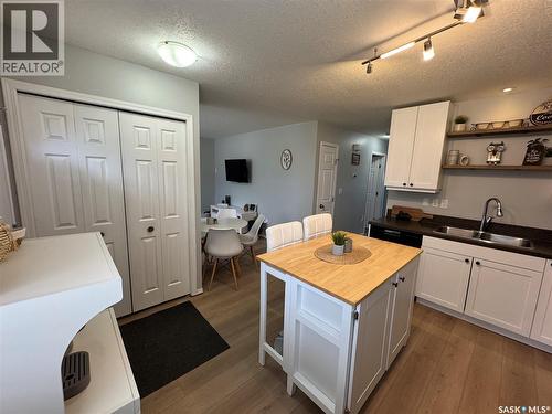 43 Marshall Crescent, Regina, SK - Indoor Photo Showing Kitchen With Double Sink