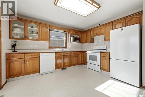 3706 Queens Gate, Regina, SK - Indoor Photo Showing Kitchen With Double Sink