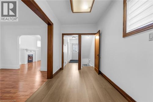 Hallway featuring light wood-finish flooring and white walls - 168 Britannia Avenue, Hamilton, ON - Indoor Photo Showing Other Room