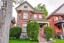 Red brick exterior with stone foundation detailing - 18 Fairleigh Crescent, Hamilton, ON  - Outdoor 