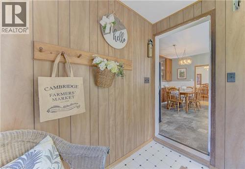Vertical wood-finish paneling throughout this entry area - 1463 Kossuth Road, Cambridge, ON - Indoor