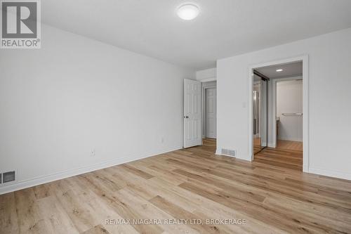 Bedroom and ensuite, lots of closet space - 202 - 250 Linwell Road, St. Catharines (Lakeport), ON 