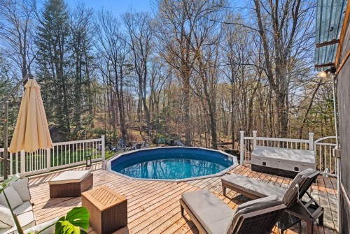 Pool - 152 Rue Du Mont-Rainer, Sainte-Agathe-Des-Monts, QC - Outdoor With Above Ground Pool With Deck Patio Veranda