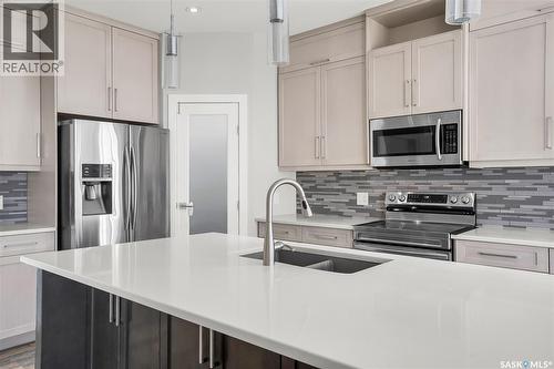 814 Werschner Court, Saskatoon, SK - Indoor Photo Showing Kitchen With Double Sink With Upgraded Kitchen