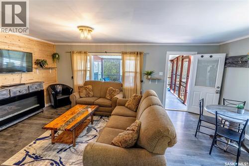 1041 Tatanka Drive, South Lake, SK - Indoor Photo Showing Living Room With Fireplace