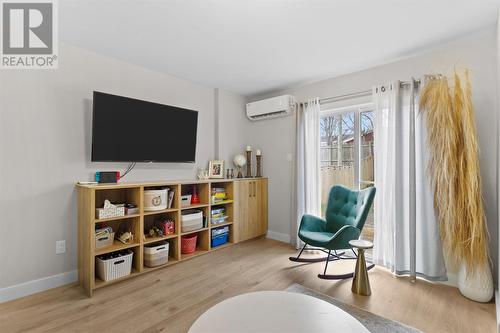 Heat Pump in Living Room with built in shelving - 13 Devine Place, St. John'S, NL - Indoor