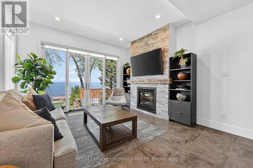 2206 Tiny Beaches Road S, Tiny, ON - Indoor Photo Showing Living Room With Fireplace
