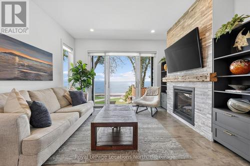 2206 Tiny Beaches Road S, Tiny, ON - Indoor Photo Showing Living Room With Fireplace