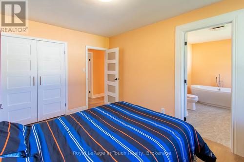 859 Cedar Point Road, Tiny, ON - Indoor Photo Showing Bedroom