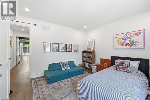 Bright room featuring recessed lighting, white walls, and wood-finish flooring - 24 Glenwood Crescent, Hamilton, ON - Indoor Photo Showing Bedroom