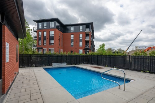 Pool - 102-175 Rue De Langloiserie, Rosemère, QC - Outdoor With View