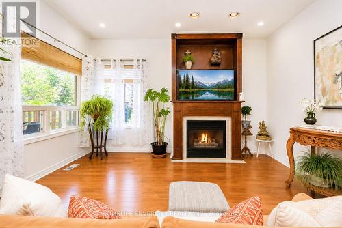 61 Pinebrook Circle, Caledon, ON - Indoor Photo Showing Living Room With Fireplace