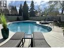 30 Cambridge Crescent, Saskatoon, SK  - Outdoor With In Ground Pool With Backyard 